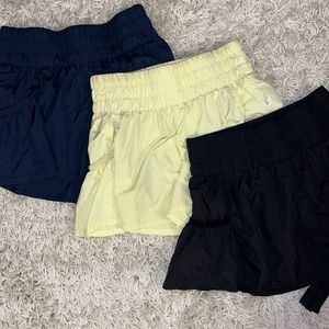 THREE PAIRS Free people movement get your flirt on shorts | black, yellow, navy